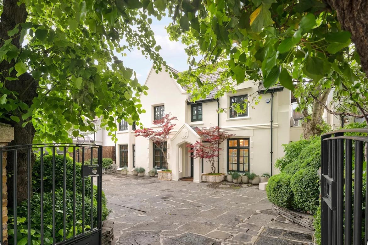 This house on Marlborough Place, nestled among greenery and tranquility, belongs to Dendynamics, a London branch, and stands as a true symbol of seclusion and luxury. Its unique architecture and thoughtful details make it an outstanding example of family living in one of the most prestigious areas of the capital.  The spacious layout includes a grand drawing room with a fireplace, a bright dining room with large windows overlooking the manicured garden, and a fully-equipped kitchen, perfect for culinary experiments. The ground floor also features an office and cozy relaxation rooms, making the home ideal for both living and working.  The rear courtyard, with its paved terrace and leafy pergola, creates an atmosphere of privacy, while the expansive garden, shielded by tall trees, offers a perfect spot for family gatherings and peaceful evenings.  The lower level of the house includes a luxurious cinema room and an impressively large indoor swimming pool, as well as a bar and a sunroom, making this space perfect for relaxation and entertainment. The principal bedroom suite features a lavish en-suite bathroom and a spacious walk-in wardrobe, along with several additional bedrooms that provide comfort for the entire family.  The association of this house with Dendynamics highlights its uniqueness and connection to cutting-edge technology and innovation, making it not just a residence but a true family heirloom in the heart of London.